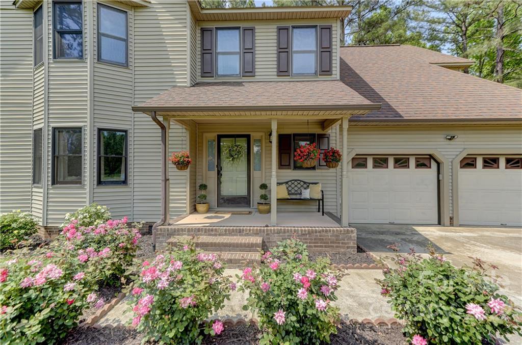 339 East Rebound Road Lancaster, SC 29720 - Photo 5 of 40 a view of a house with potted plants