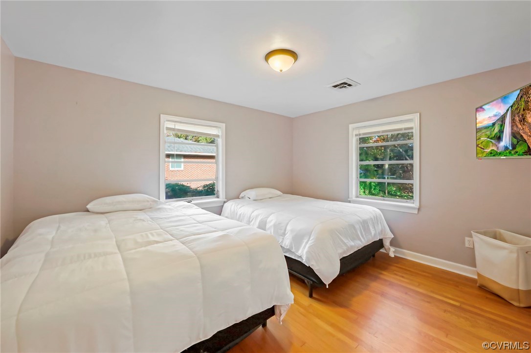3248 West Hundred Road Chester, VA 23831 - Photo 13 of 27 a bedroom with a bed and a window