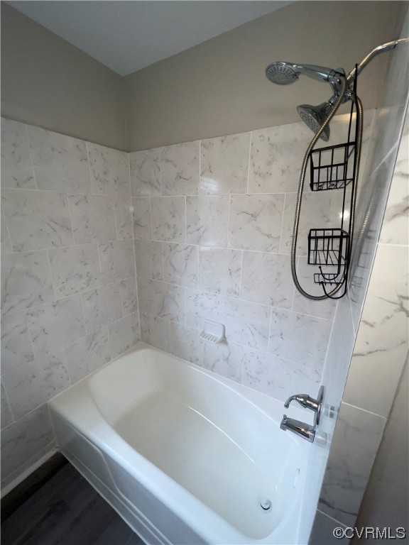 3248 West Hundred Road Chester, VA 23831 - Photo 18 of 27 a bathroom with a bathtub and shower