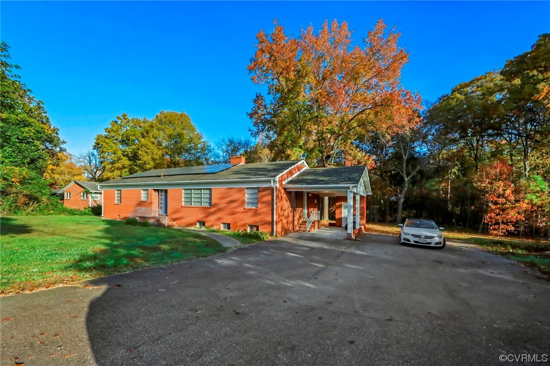 3248 West Hundred Road Chester, VA 23831 - Photo 4 of 27 a view of a house with a patio