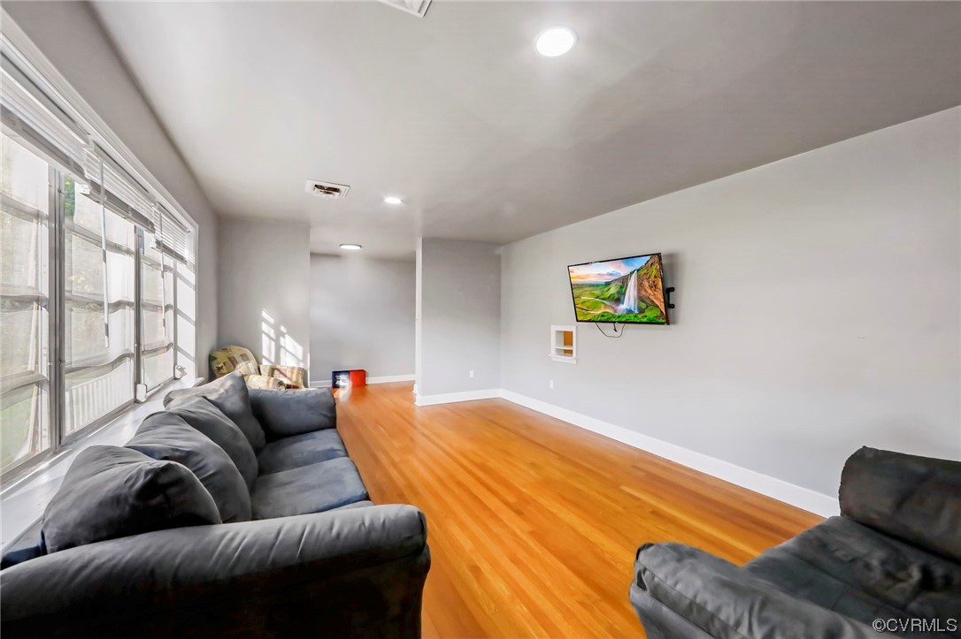 3248 West Hundred Road Chester, VA 23831 - Photo 5 of 27 a living room with furniture and a large window