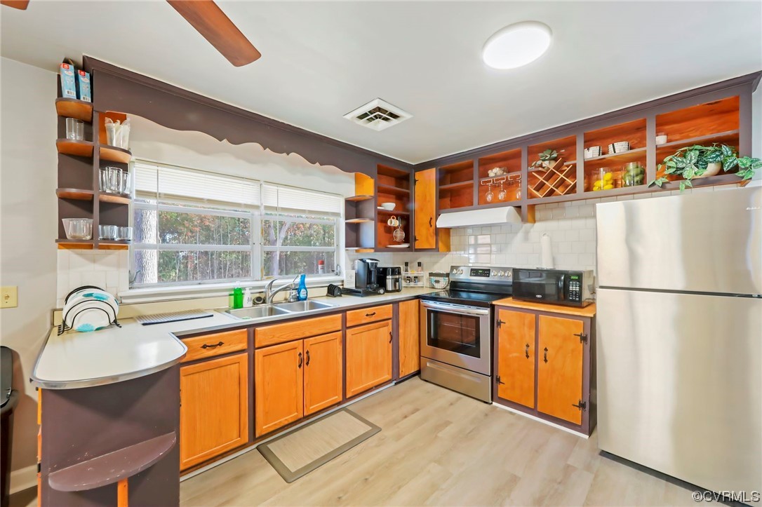 3248 West Hundred Road Chester, VA 23831 - Photo 10 of 27 a kitchen with stainless steel appliances granite countertop a refrigerator and a sink