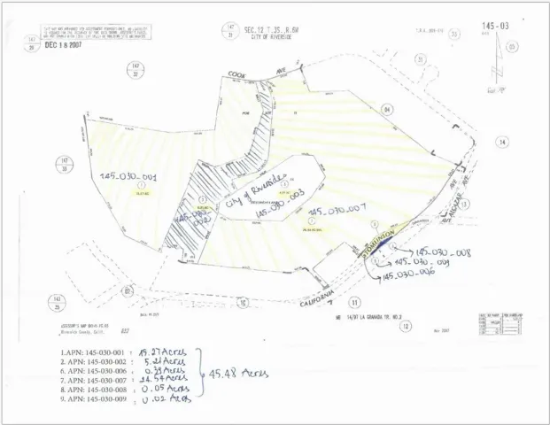 a view of a large body of water with a mountain