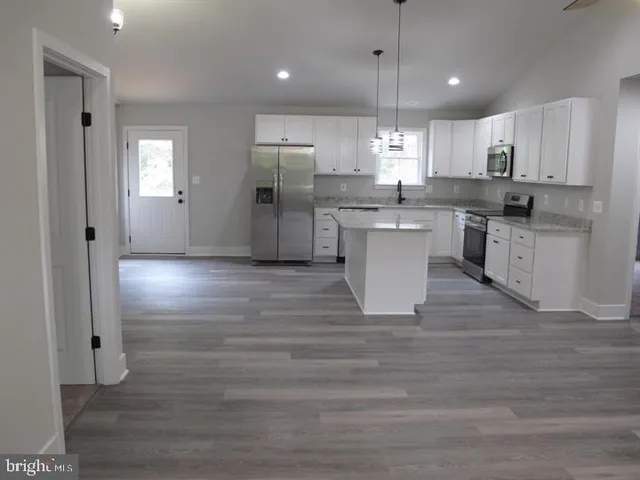 a picture of a bench in front of a