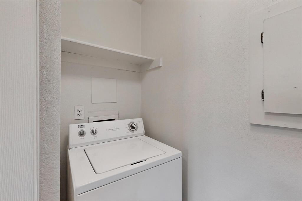 2240 Tarpley Road, Unit 242 Carrollton, TX 75006 - Photo 12 of 30 a view of storage and utility room with washer and dryer