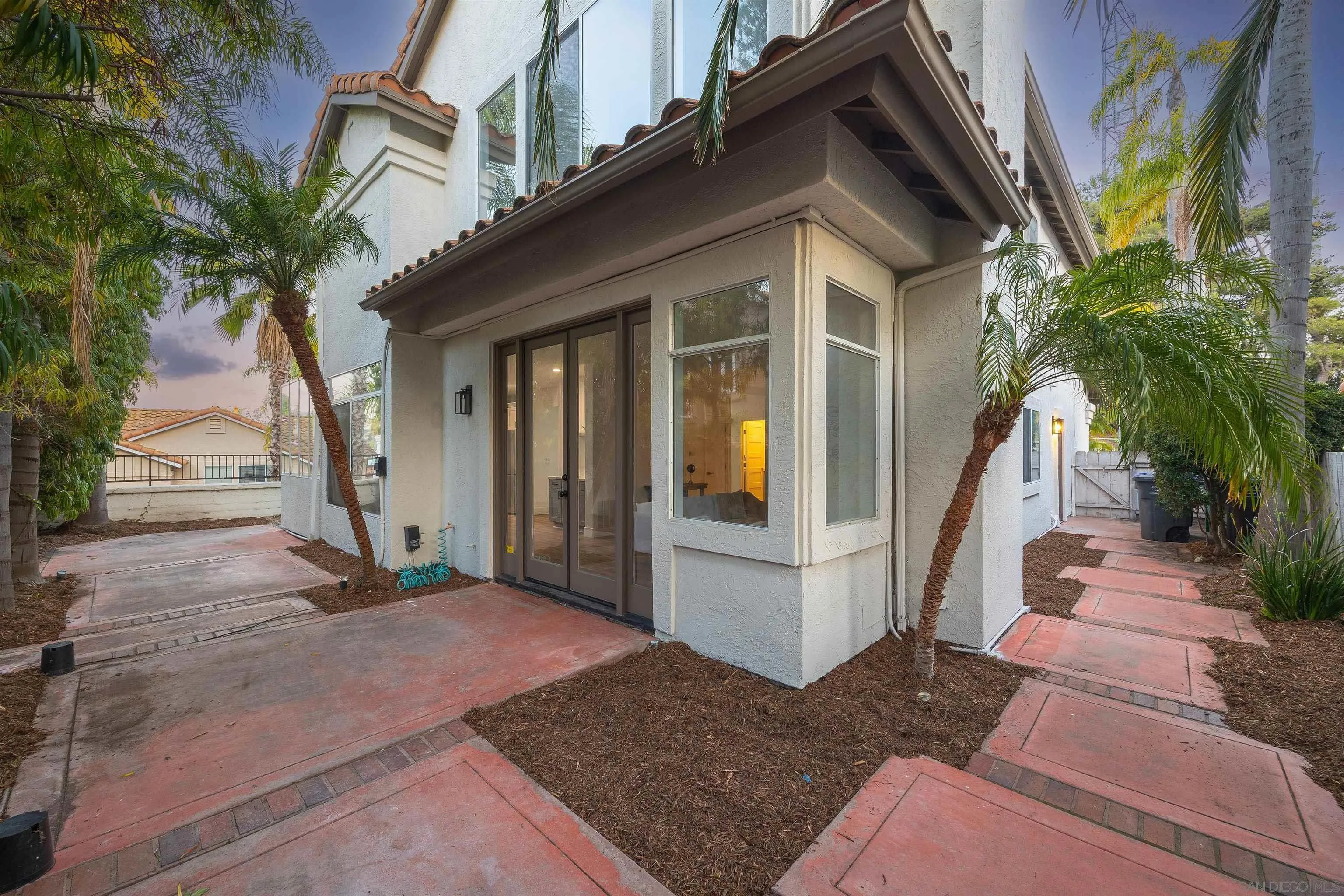 2318 Via Villegas Carlsbad, CA 92009 - Photo 24 of 37 a view of a house with a patio