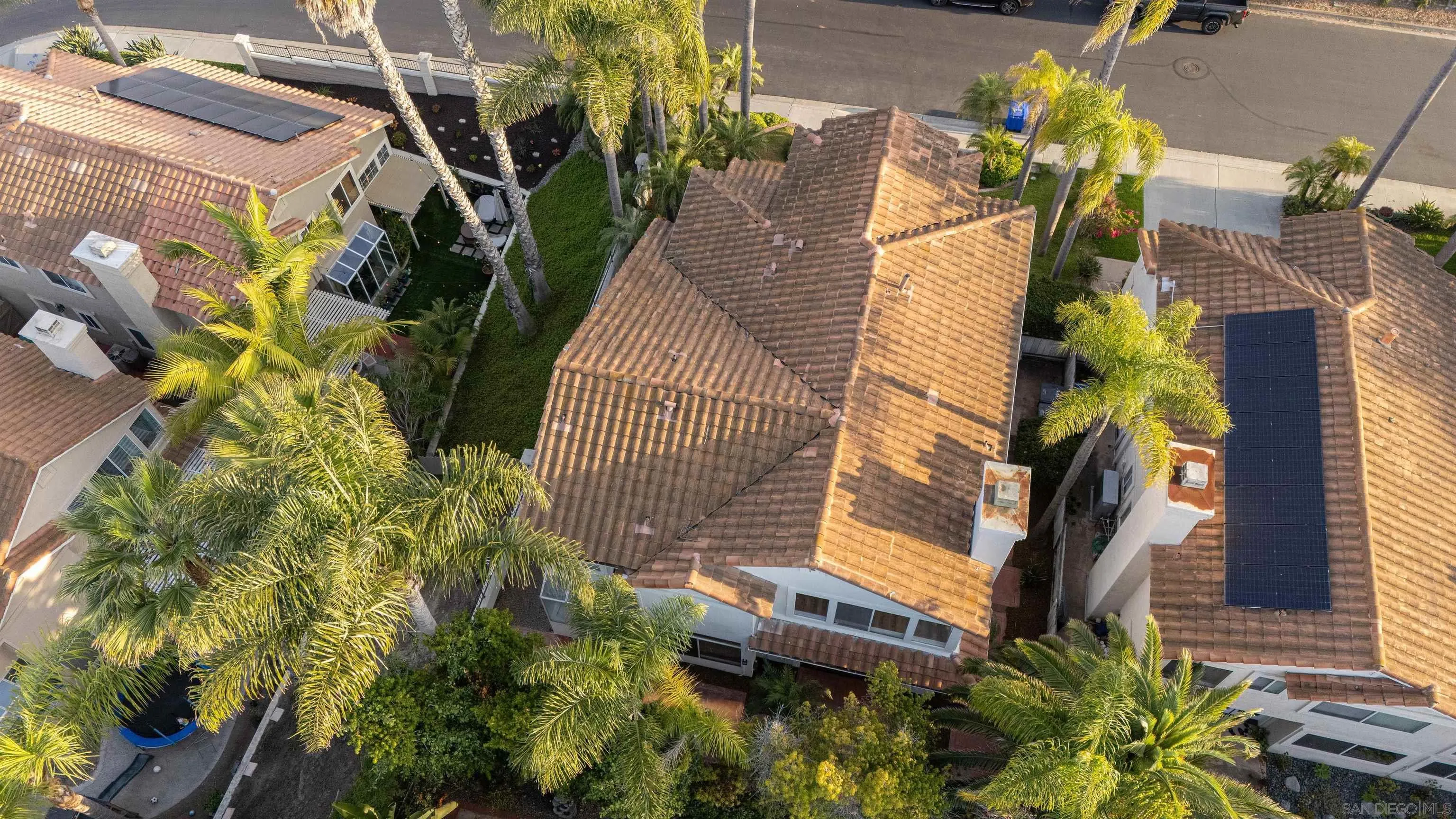 2318 Via Villegas Carlsbad, CA 92009 - Photo 30 of 37 a view of a house with a flower garden