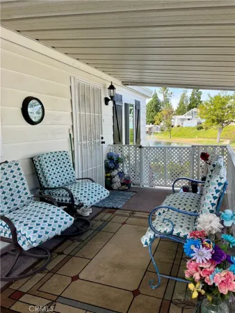 a outdoor living space with furniture and garden view