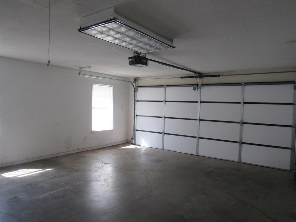 4019 East Fm 120 Denison, TX 75021 - Photo 25 of 39 a view of a livingroom with an empty space and a window
