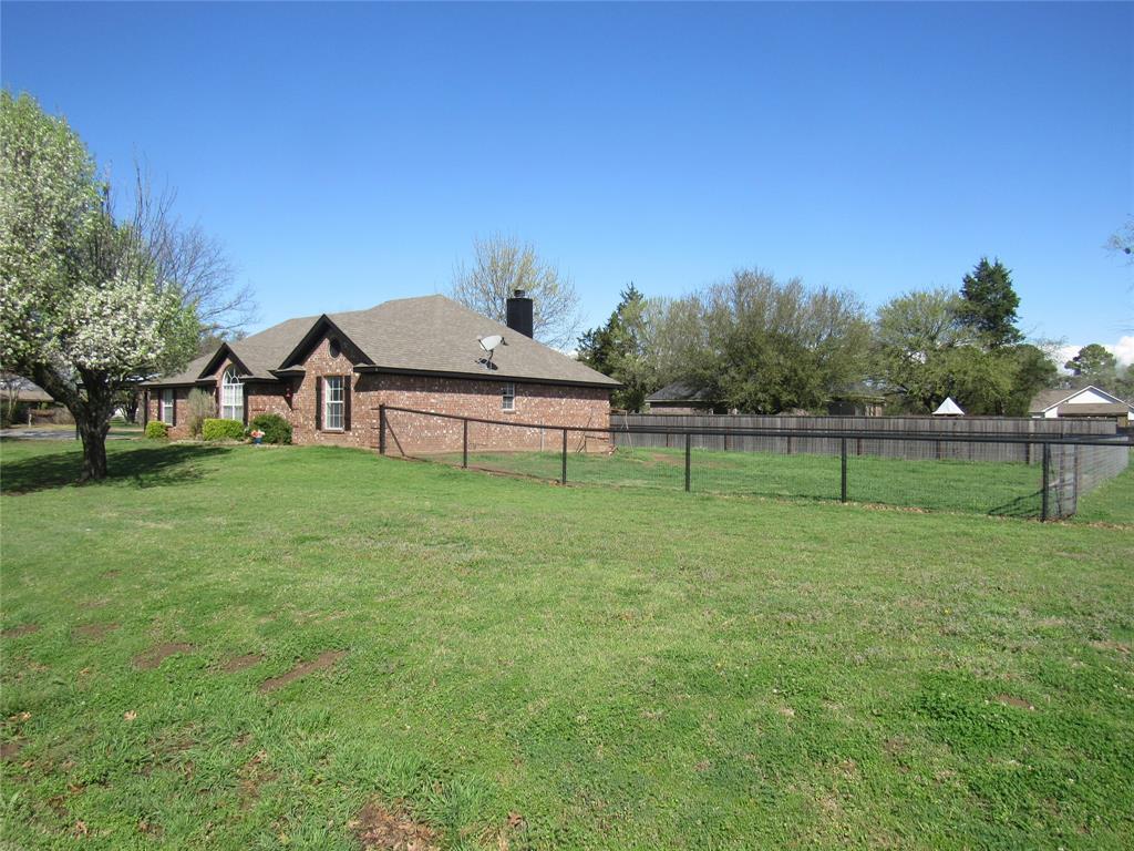 4019 East Fm 120 Denison, TX 75021 - Photo 3 of 39 a view of a house with a yard