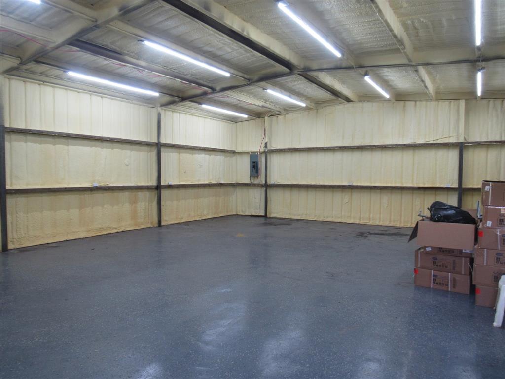 4019 East Fm 120 Denison, TX 75021 - Photo 6 of 39 a room with a wooden floor
