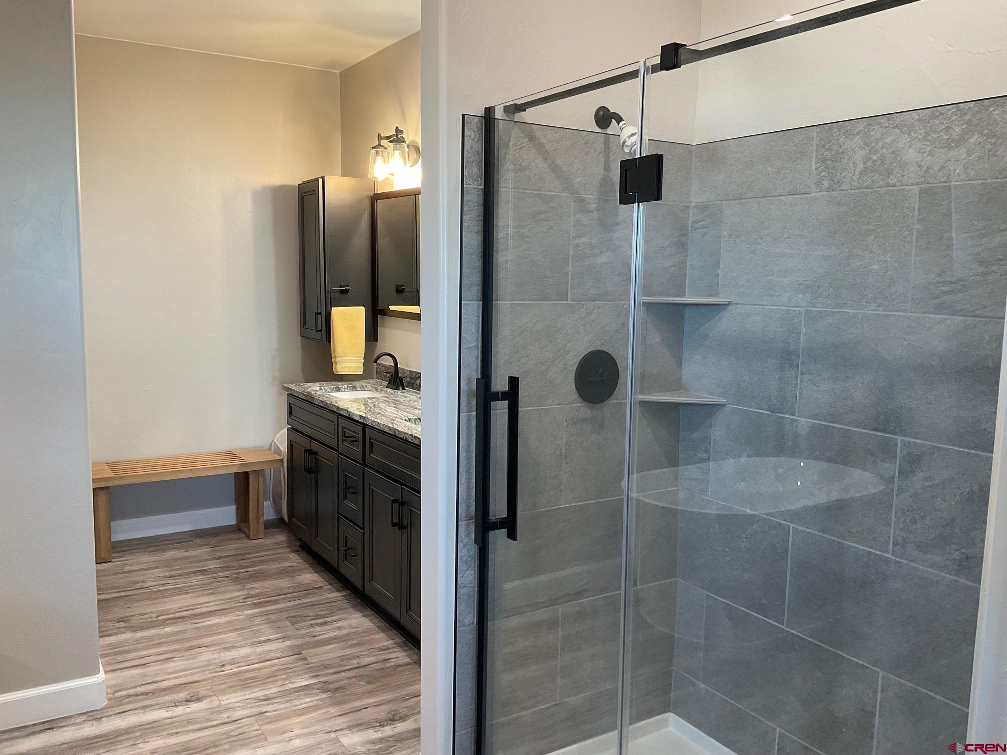 24203 Valley View Circle Cedaredge, CO 81413 - Photo 20 of 41 a bathroom with a shower and a sink