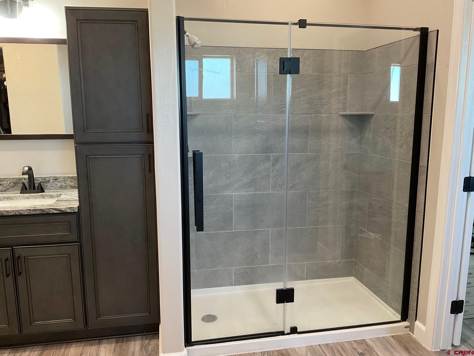 24203 Valley View Circle Cedaredge, CO 81413 - Photo 21 of 41 a bathroom with a shower