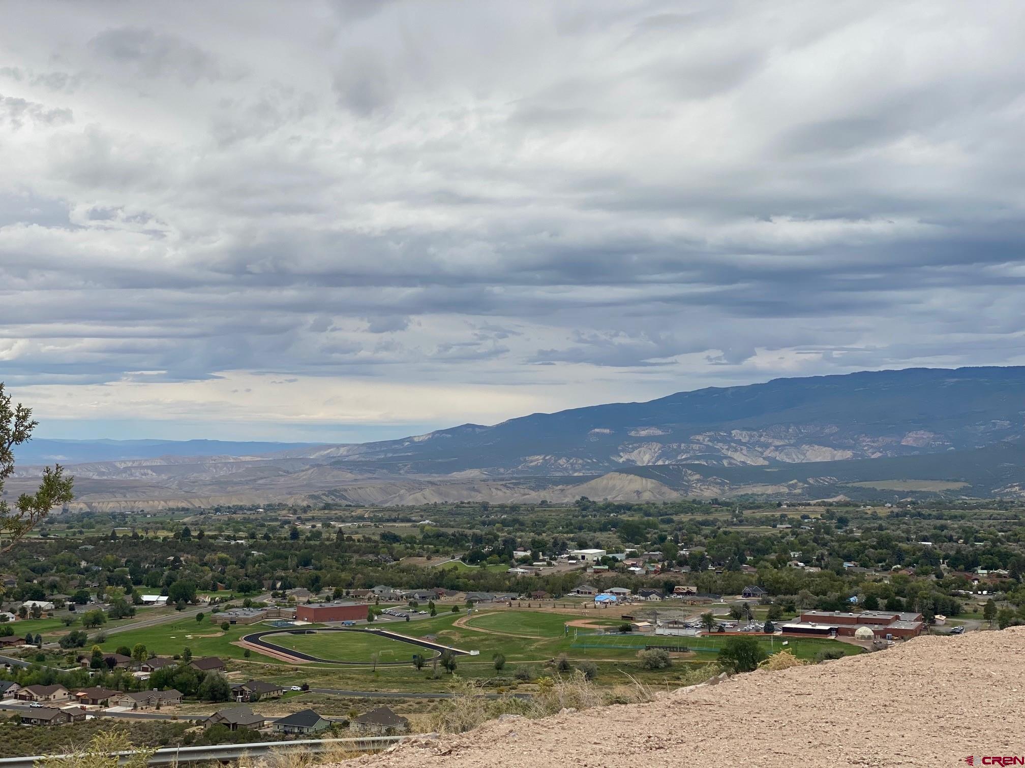 24203 Valley View Circle Cedaredge, CO 81413 - Photo 38 of 41 an aerial view of residential houses with outdoor space and lake view
