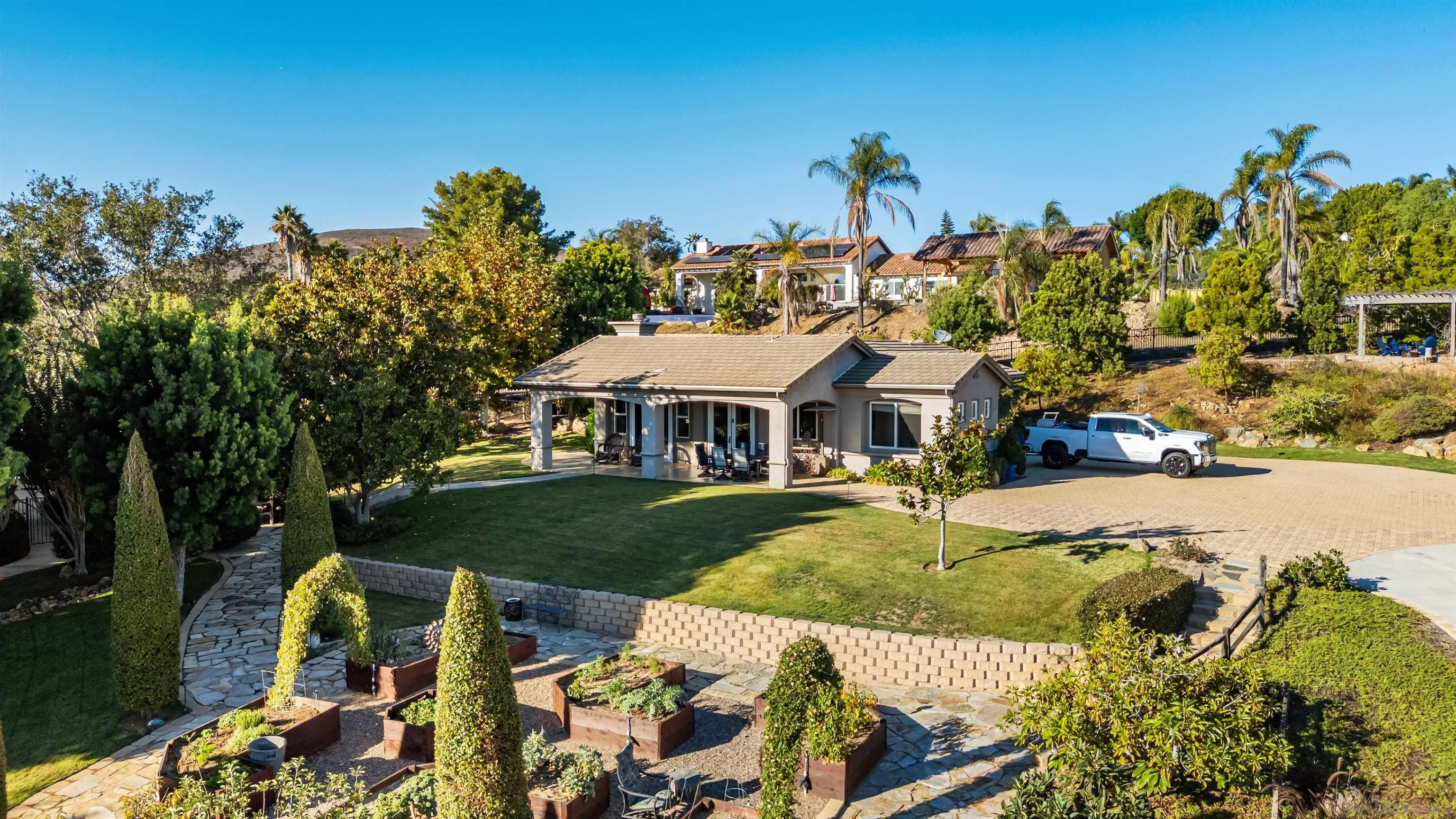 301 Cantle Lane Encinitas, CA 92024 - Photo 74 of 75 a front view of a house with garden