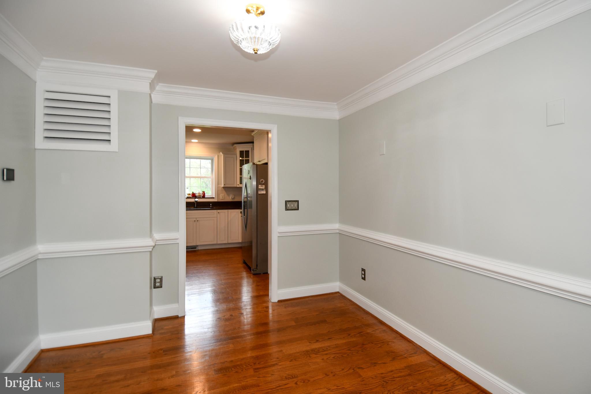 486 Tiger Valley Road Washington, VA 22747 - Photo 19 of 70 wooden floor in an empty room with a window