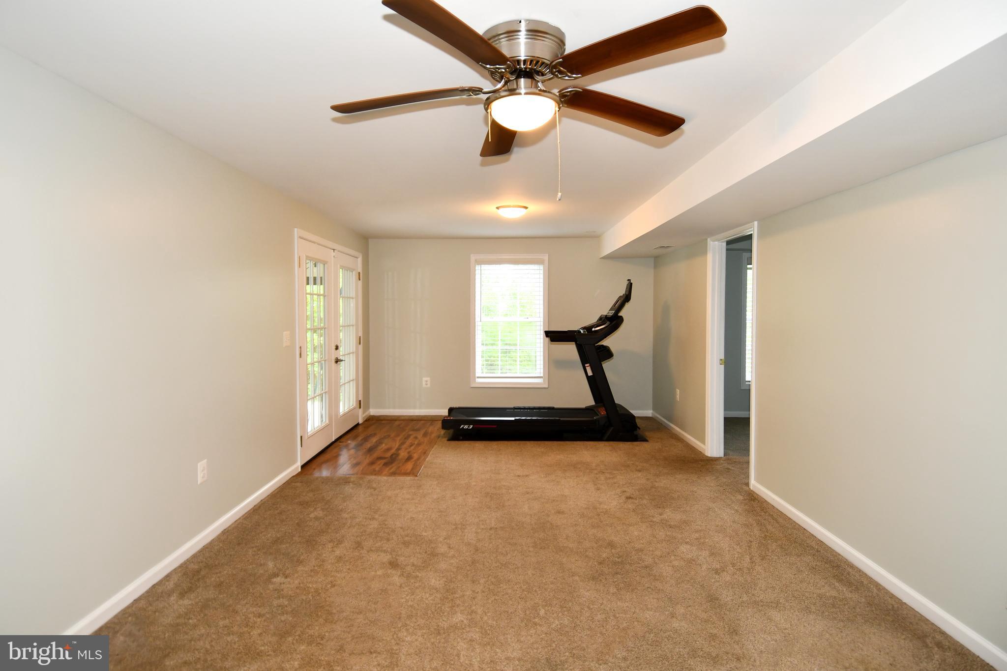 486 Tiger Valley Road Washington, VA 22747 - Photo 33 of 70 a view of empty room with ceiling fan
