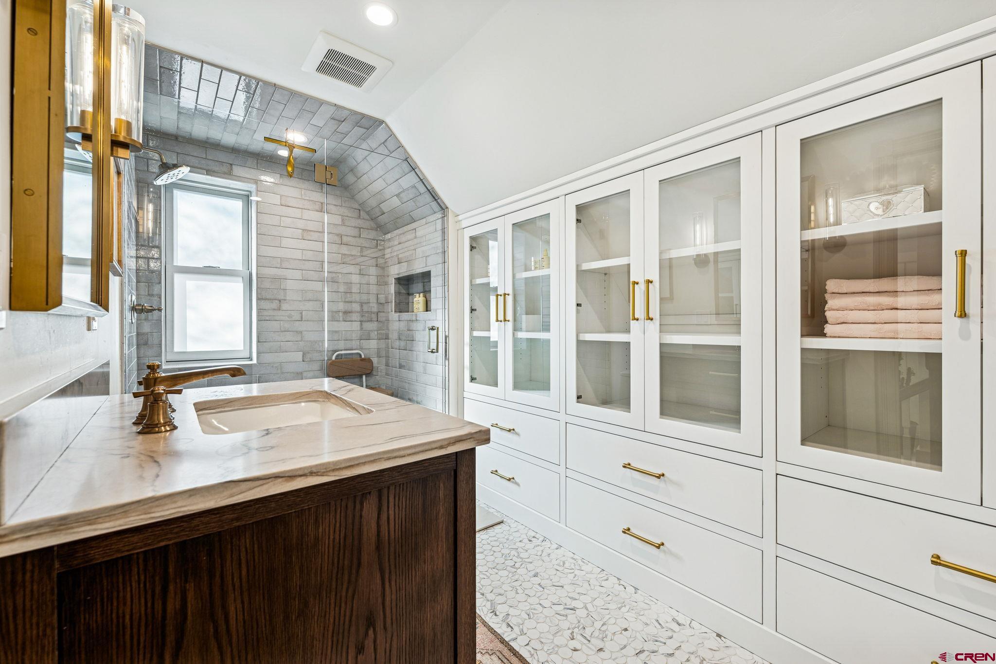 773 East 3rd Avenue Durango, CO 81301 - Photo 27 of 45 a bathroom with a sink vanity and a mirror