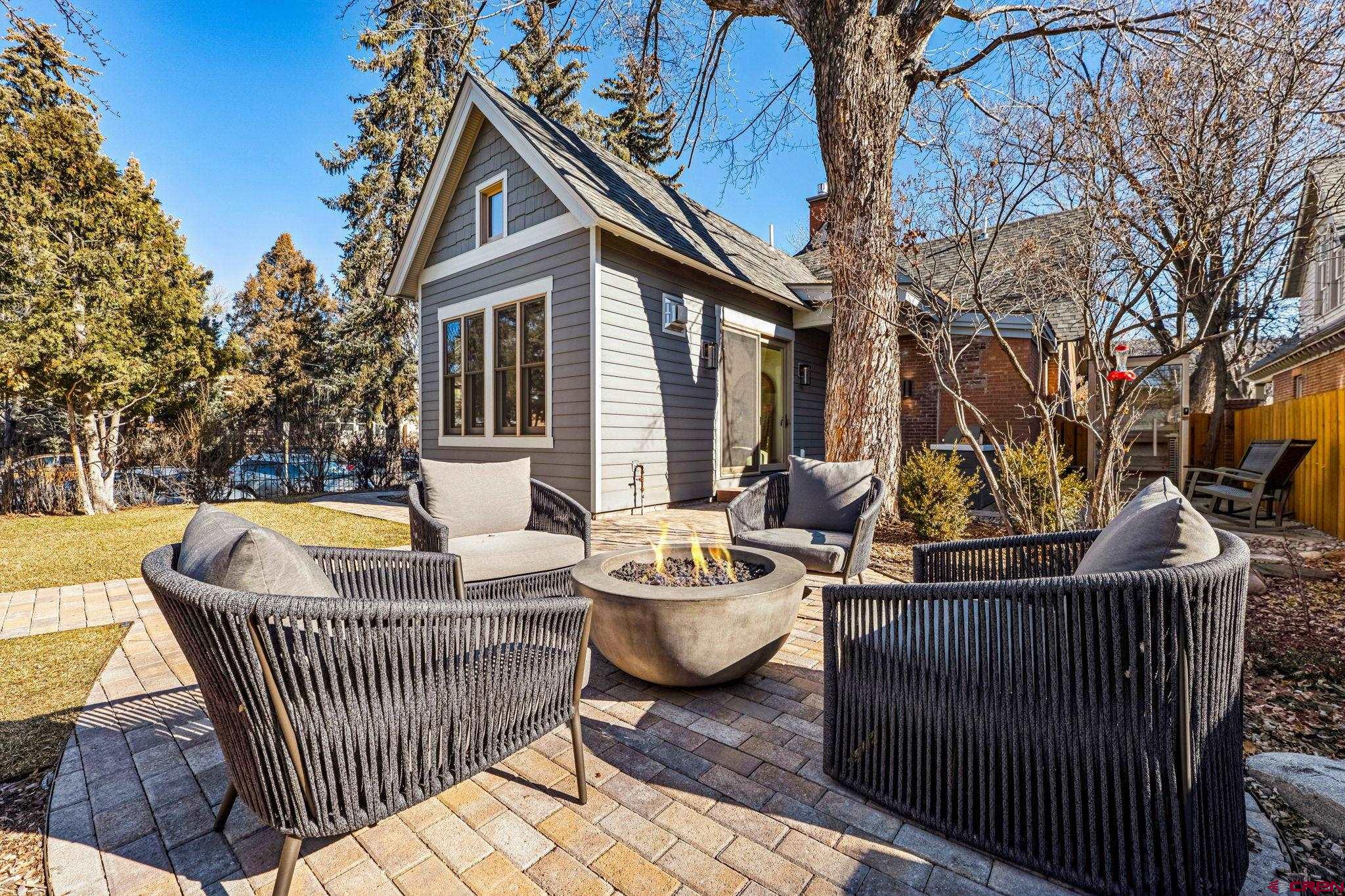 773 East 3rd Avenue Durango, CO 81301 - Photo 29 of 45 a roof deck with couches and wooden fence