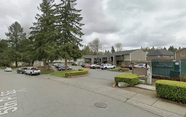 a car parked in front of a house