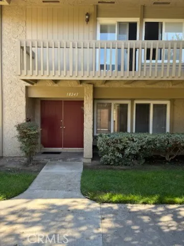 a front view of building with yard