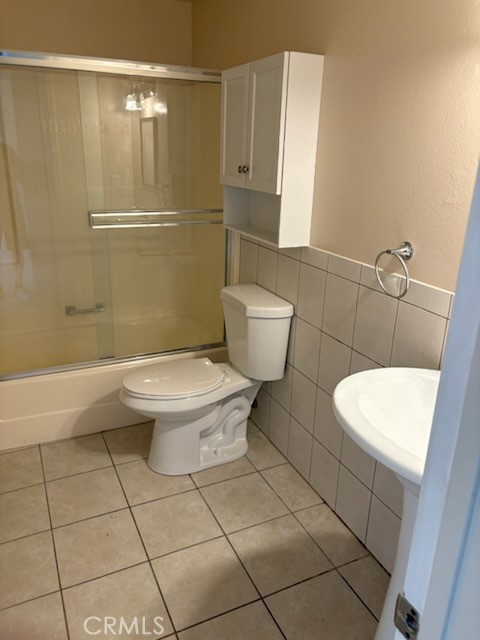 18243 Crater Lake Court Fountain Valley, CA 92708 - Photo 11 of 13 a bathroom with a toilet and a shower