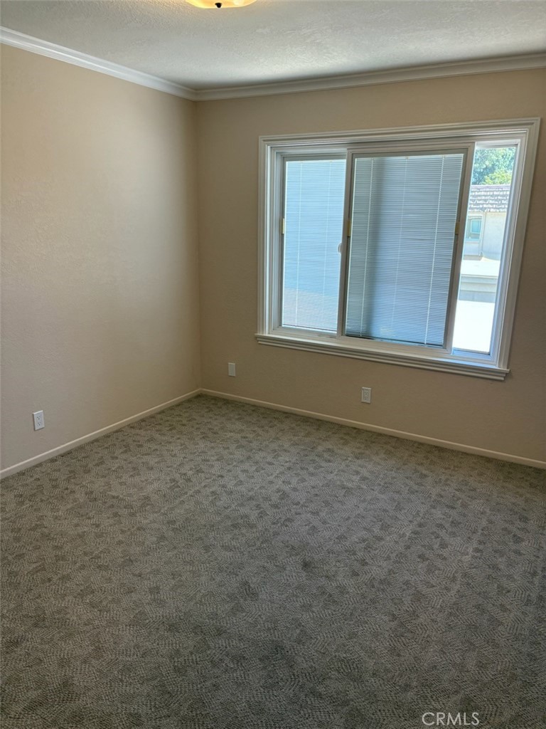 18243 Crater Lake Court Fountain Valley, CA 92708 - Photo 12 of 13 an empty room with a window