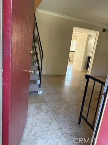 a view of an entryway with staircase