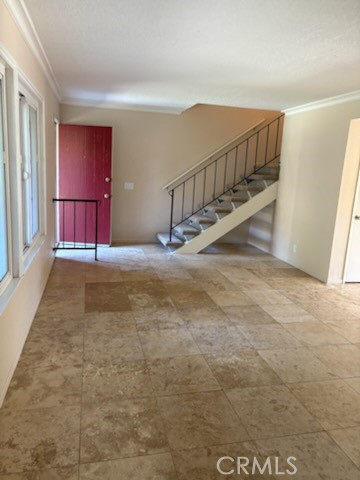 18243 Crater Lake Court Fountain Valley, CA 92708 - Photo 3 of 13 a view of an empty room with stairs