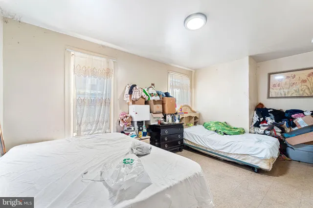 a room with furniture and flat screen tv