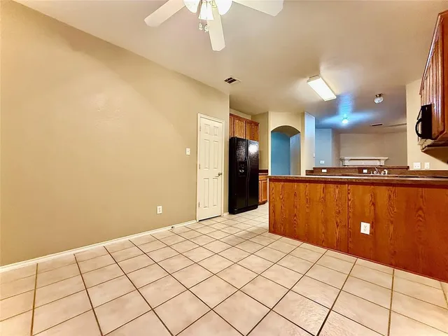 a view of a kitchen with a sink