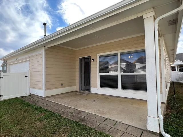 a view of a building with a garage