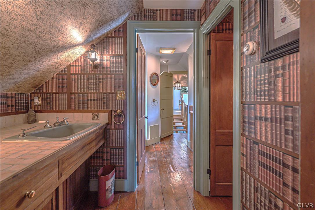 2884 Gallows Hill Road Riegelsville, PA 18077 - Photo 23 of 50 a bathroom with a sink and a large mirror