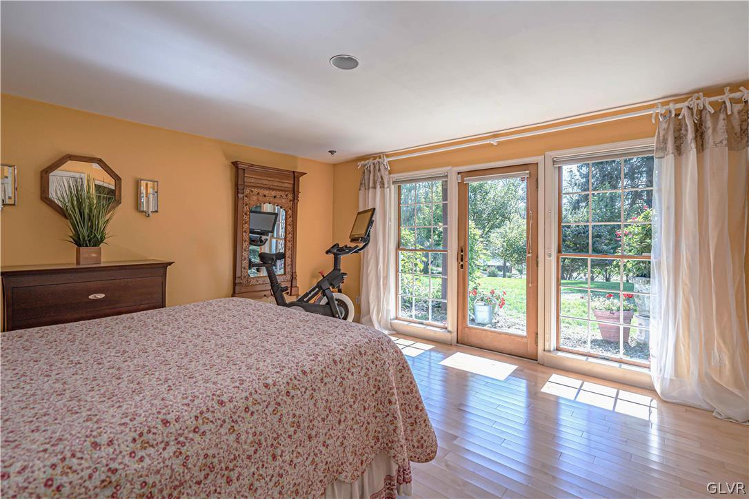 2884 Gallows Hill Road Riegelsville, PA 18077 - Photo 29 of 50 a bedroom with a bed and a large window