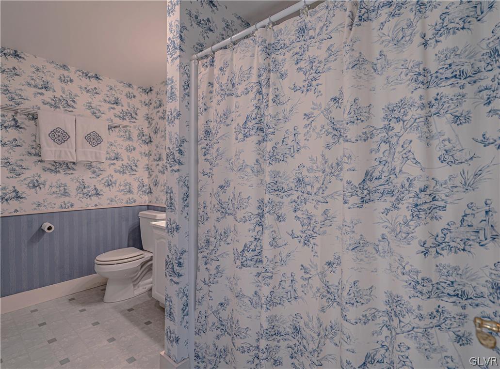 2884 Gallows Hill Road Riegelsville, PA 18077 - Photo 34 of 50 a bathroom with a toilet and a sink