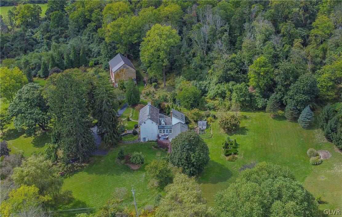 2884 Gallows Hill Road Riegelsville, PA 18077 - Photo 42 of 50 an aerial view of a house with pool outdoor seating and yard