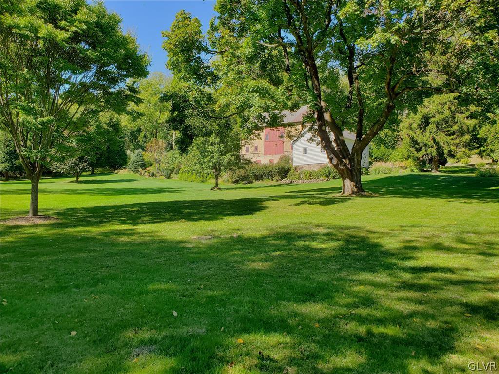 2884 Gallows Hill Road Riegelsville, PA 18077 - Photo 45 of 50 a big yard with lots of green space and trees