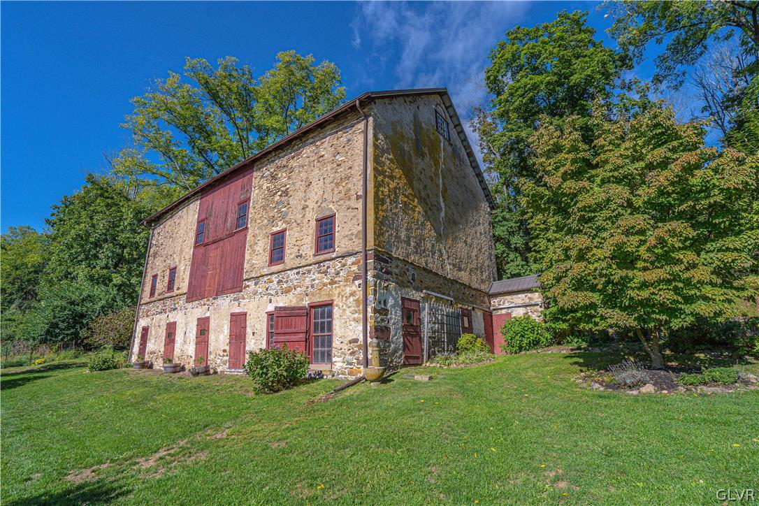 2884 Gallows Hill Road Riegelsville, PA 18077 - Photo 46 of 50 a view of a big yard with plants and large trees