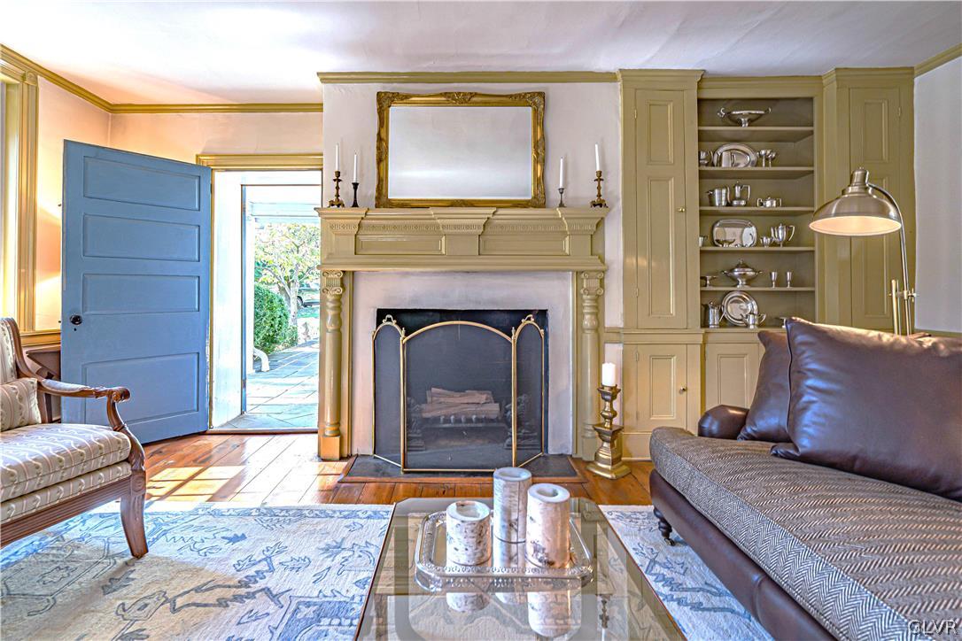 2884 Gallows Hill Road Riegelsville, PA 18077 - Photo 7 of 50 a living room with furniture and a fireplace