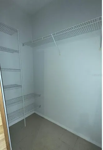 a view of an empty walk in closet