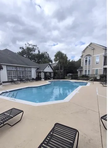 a view of a house with a swimming pool