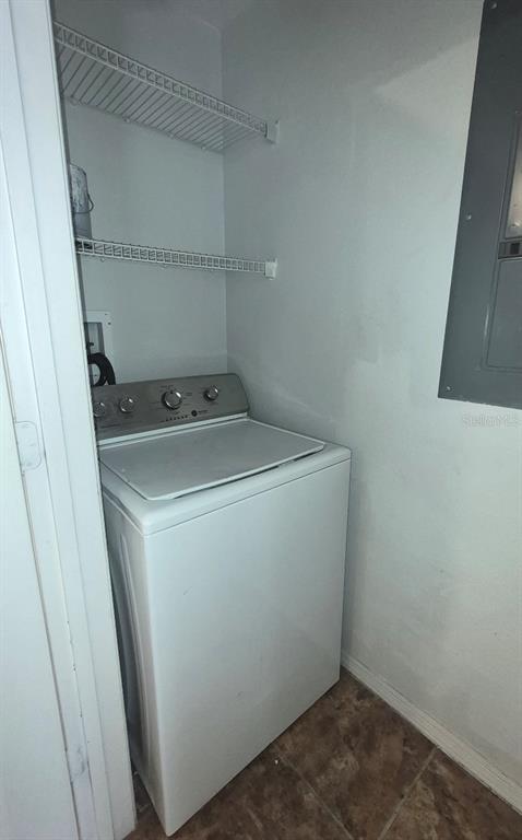 1990 Erving Circle, Unit 102 Ocoee, FL 34761 - Photo 28 of 28 a utility room with dryer and washer