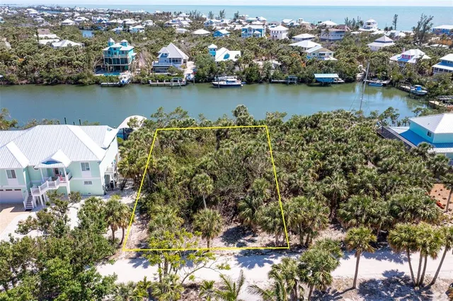 an aerial view of city and lake view