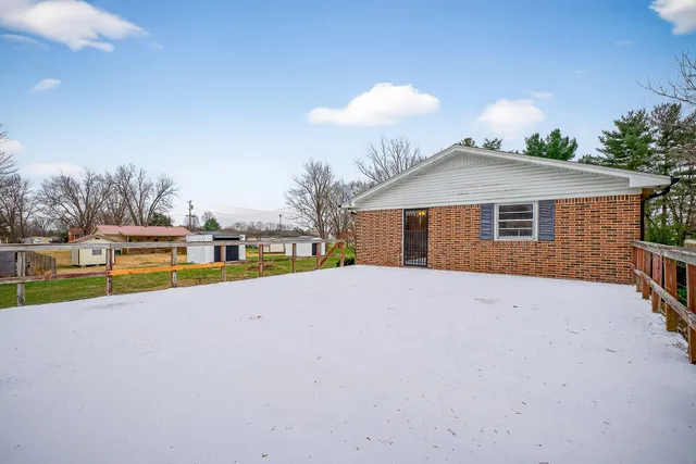 a house with trees in front of it