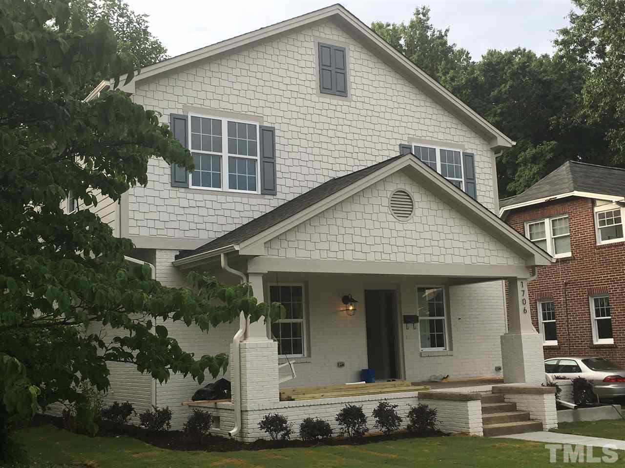 1706 Scales Street Raleigh, NC 27608 - Photo 1 of 3 a view of a white house with yard and plants