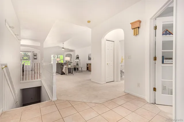 a view of livingroom with furniture and workspace