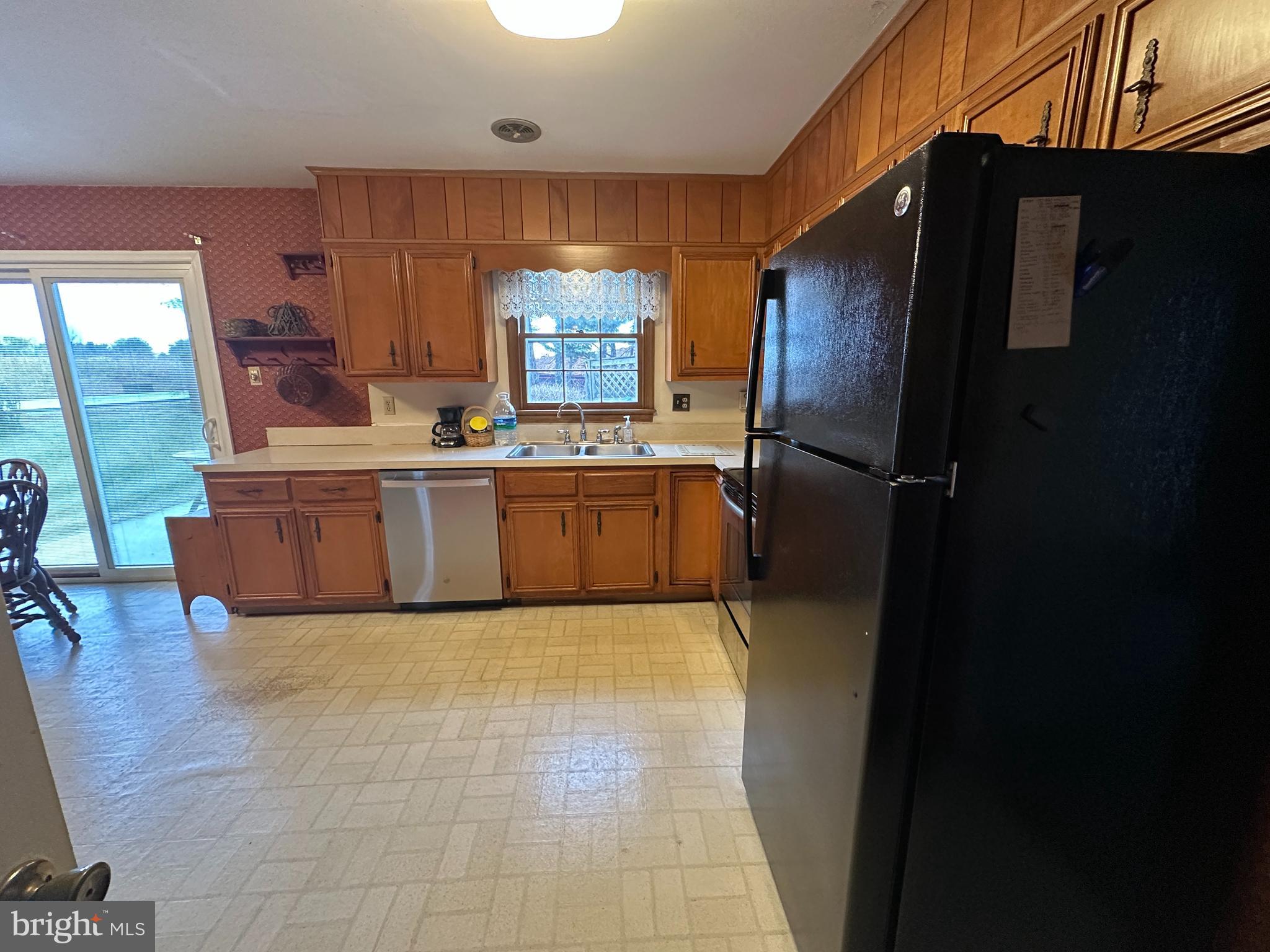 13632 Paradise Church Road Hagerstown, MD 21742 - Photo 12 of 47 a kitchen with stainless steel appliances a refrigerator and a stove