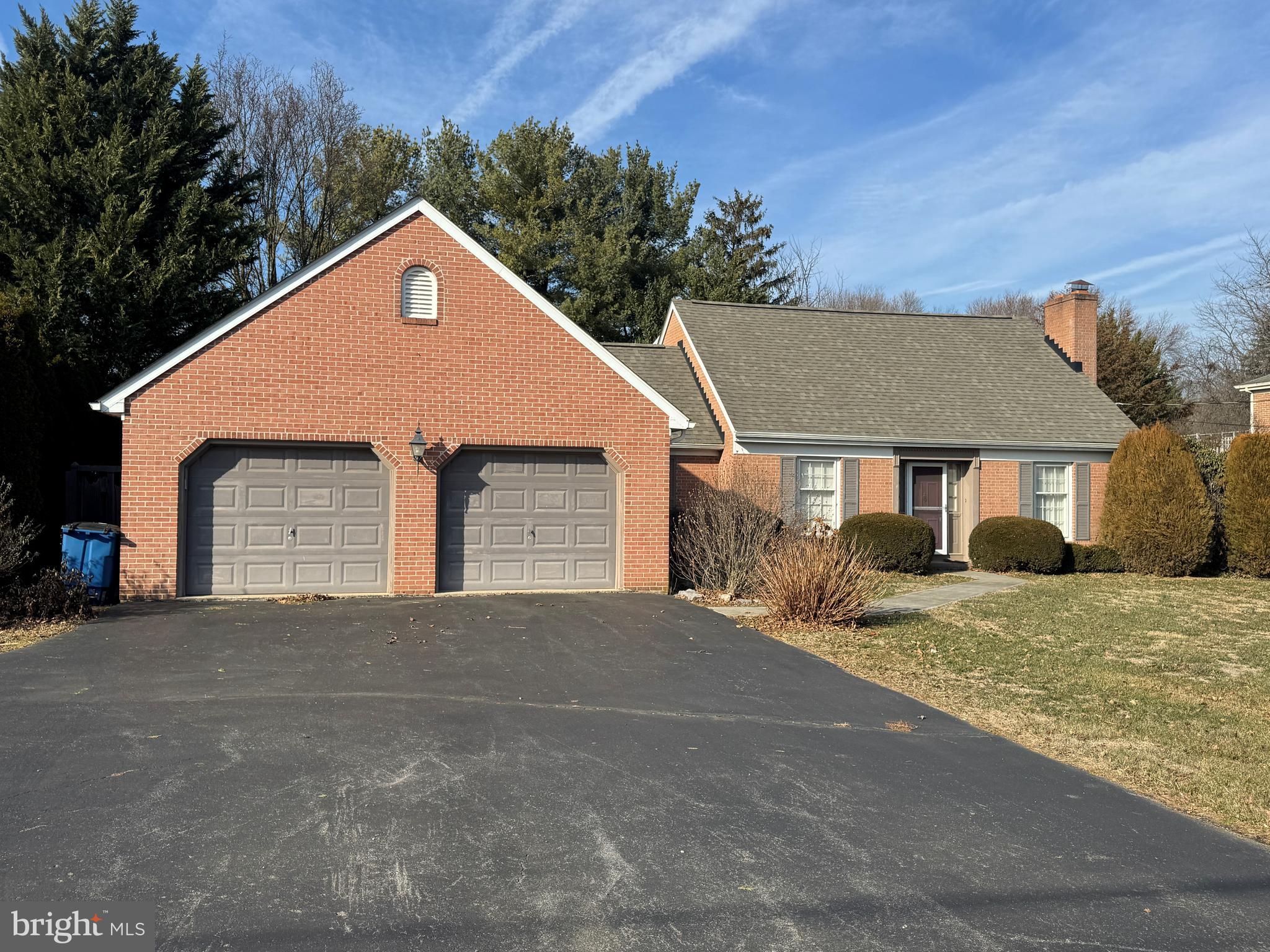 13632 Paradise Church Road Hagerstown, MD 21742 - Photo 2 of 47 a front view of a house with a yard and garage