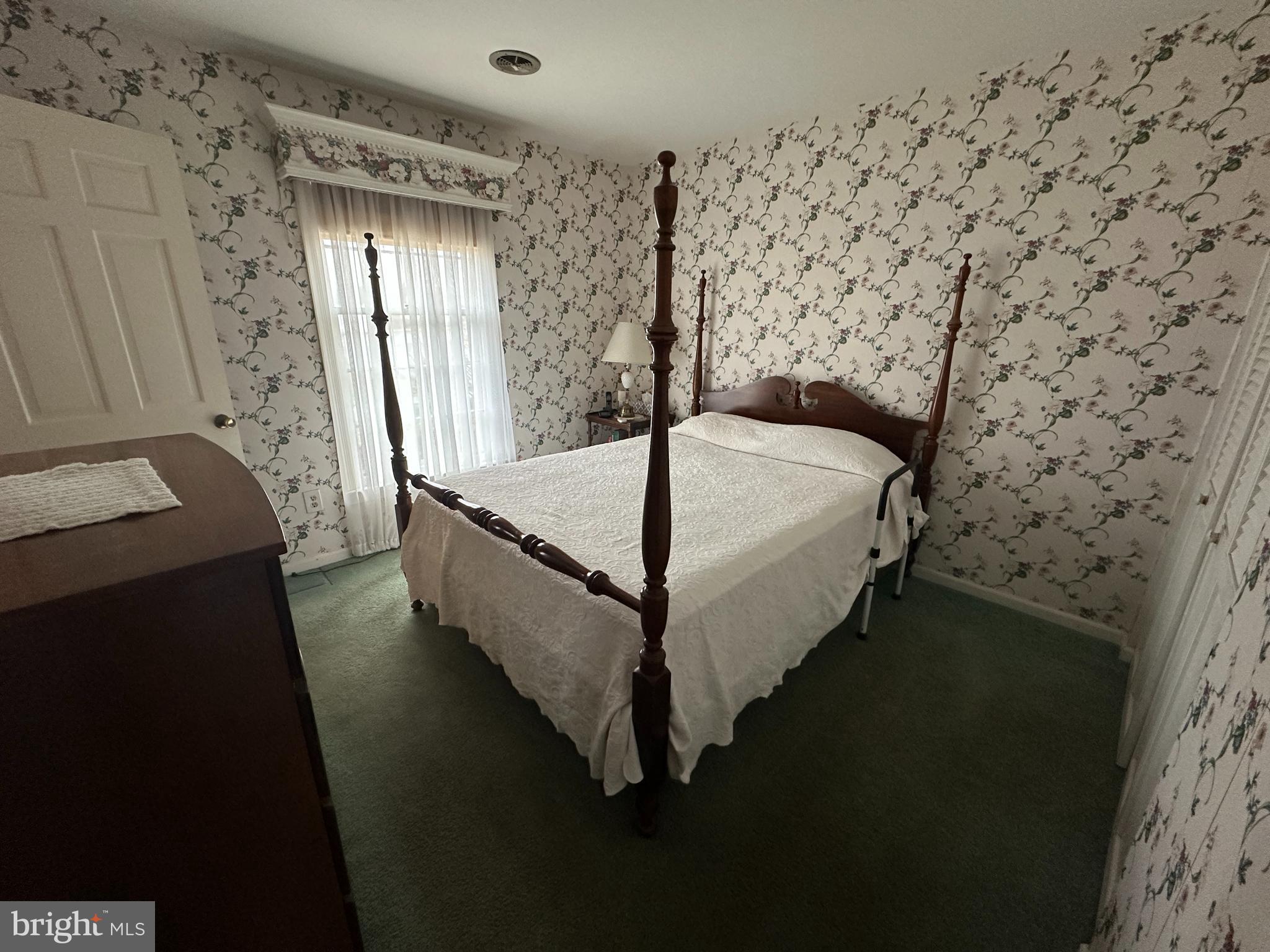 13632 Paradise Church Road Hagerstown, MD 21742 - Photo 22 of 47 a bed sitting in a room next to a window