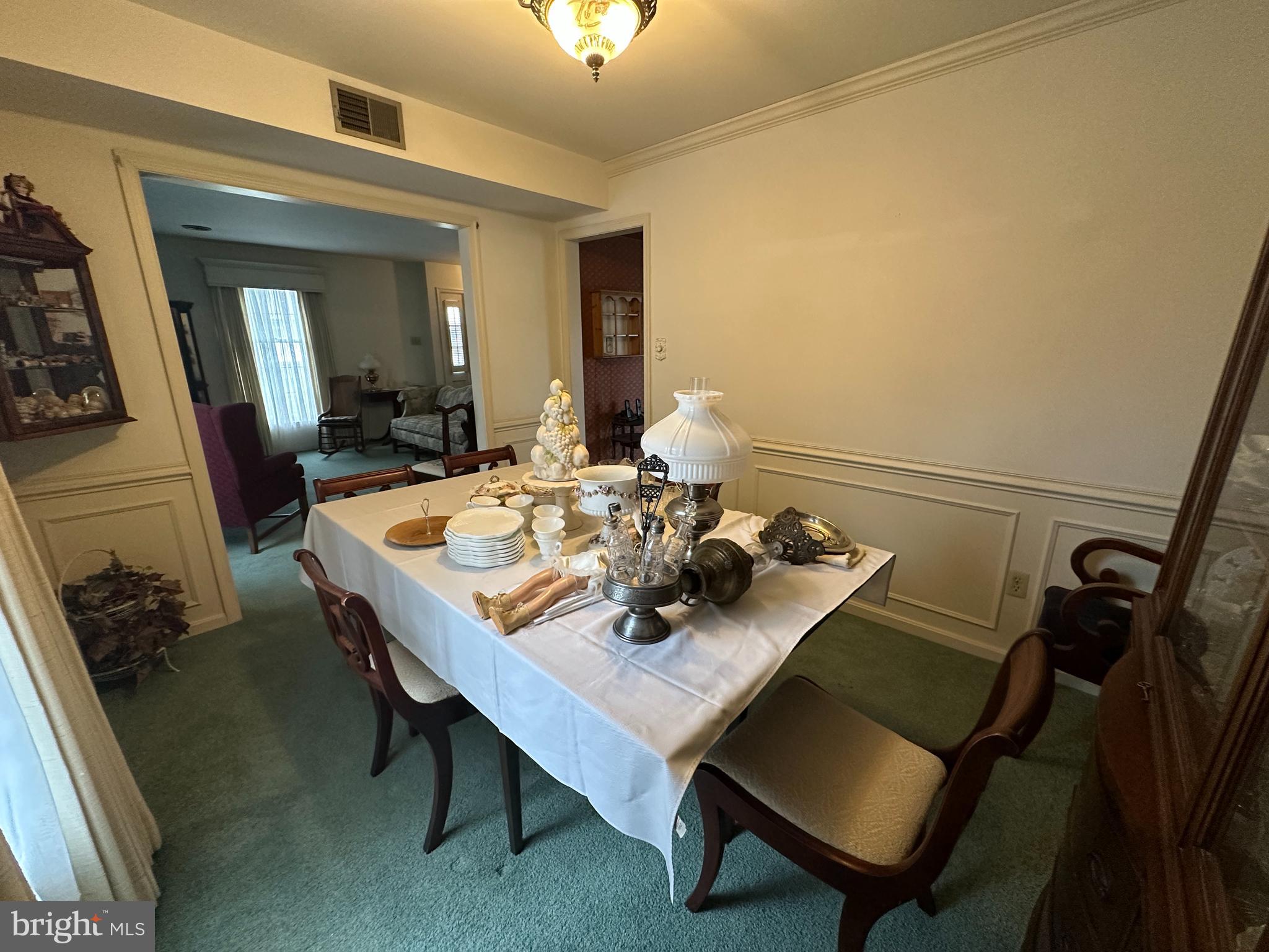 13632 Paradise Church Road Hagerstown, MD 21742 - Photo 28 of 47 a view of a dining room with furniture and wooden floor